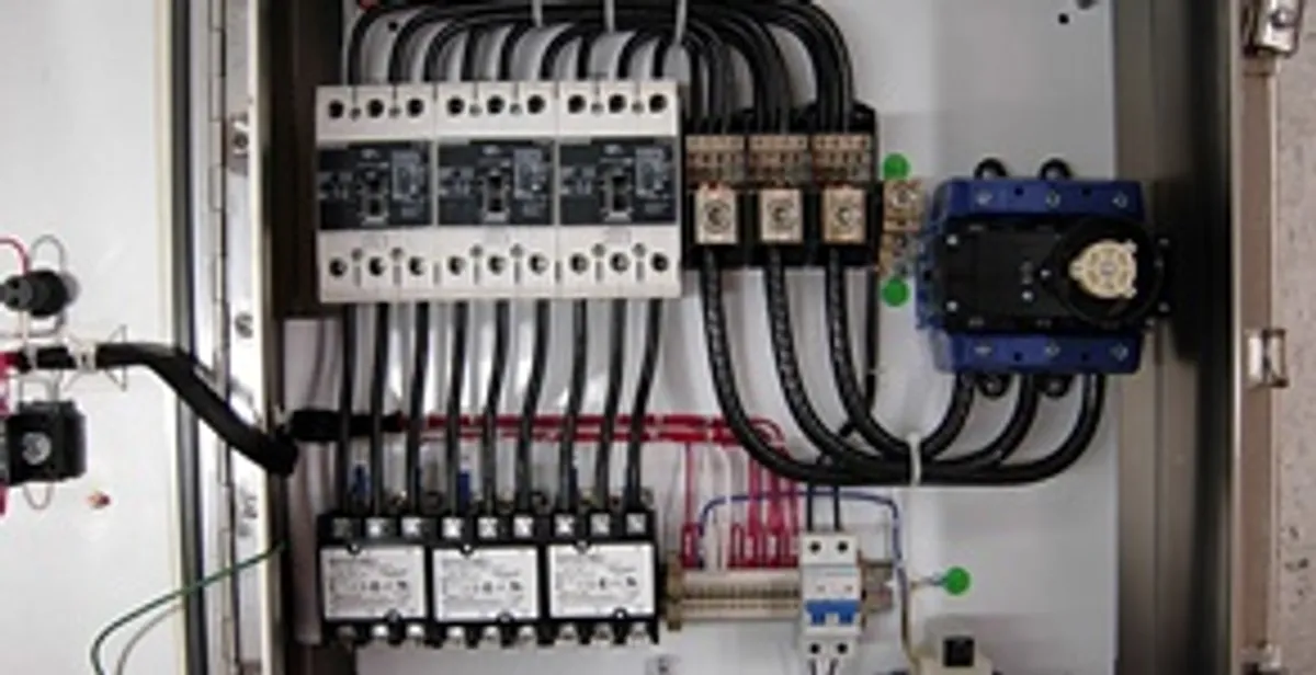 Electrical panel installation with organized circuit breakers and wiring in San Antonio, TX