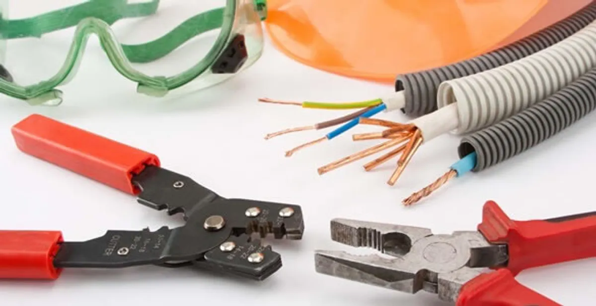 Electrical wiring repair with professional tools and safety equipment in Helotes, TX