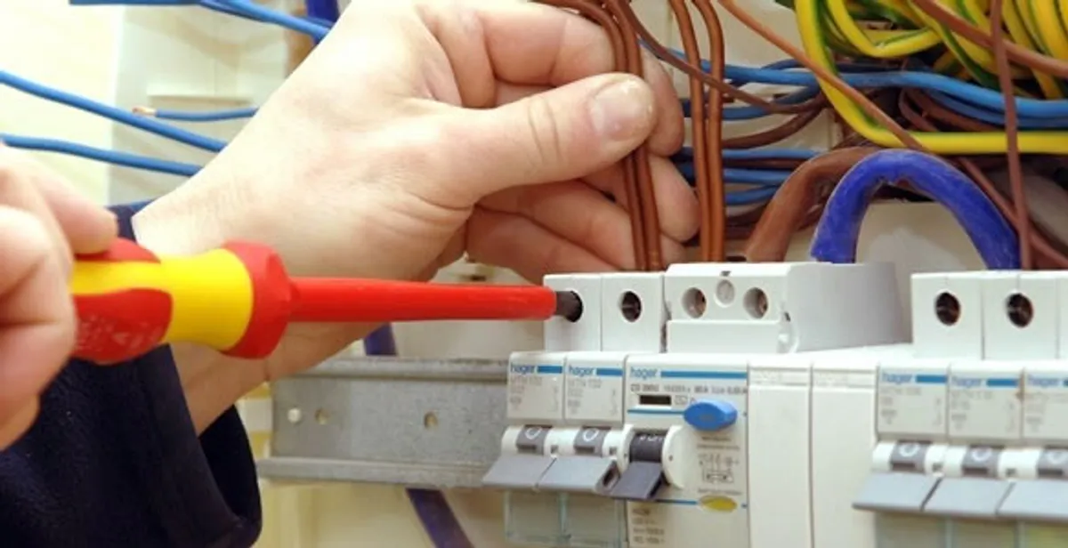 electrician services performing professional electrical panel wiring and connections in San Antonio, TX