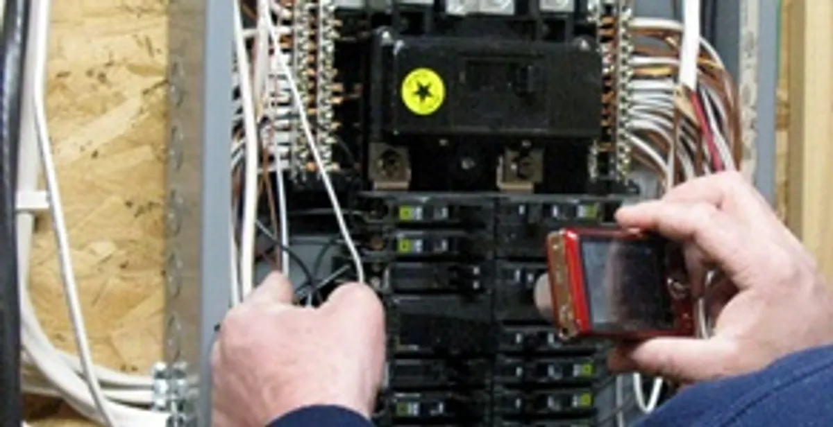 Home electrical inspection of circuit breaker panel by licensed electrician in San Antonio, TX