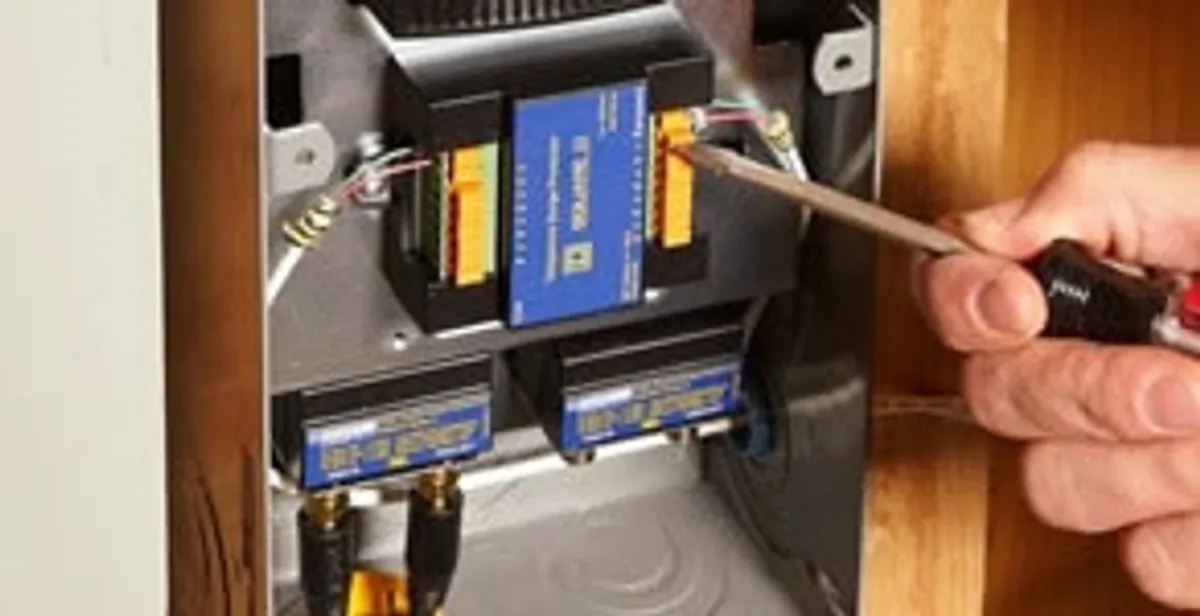 Whole home surge protection device being installed by a licensed electrician to protect electrical systems in San Antonio, TX